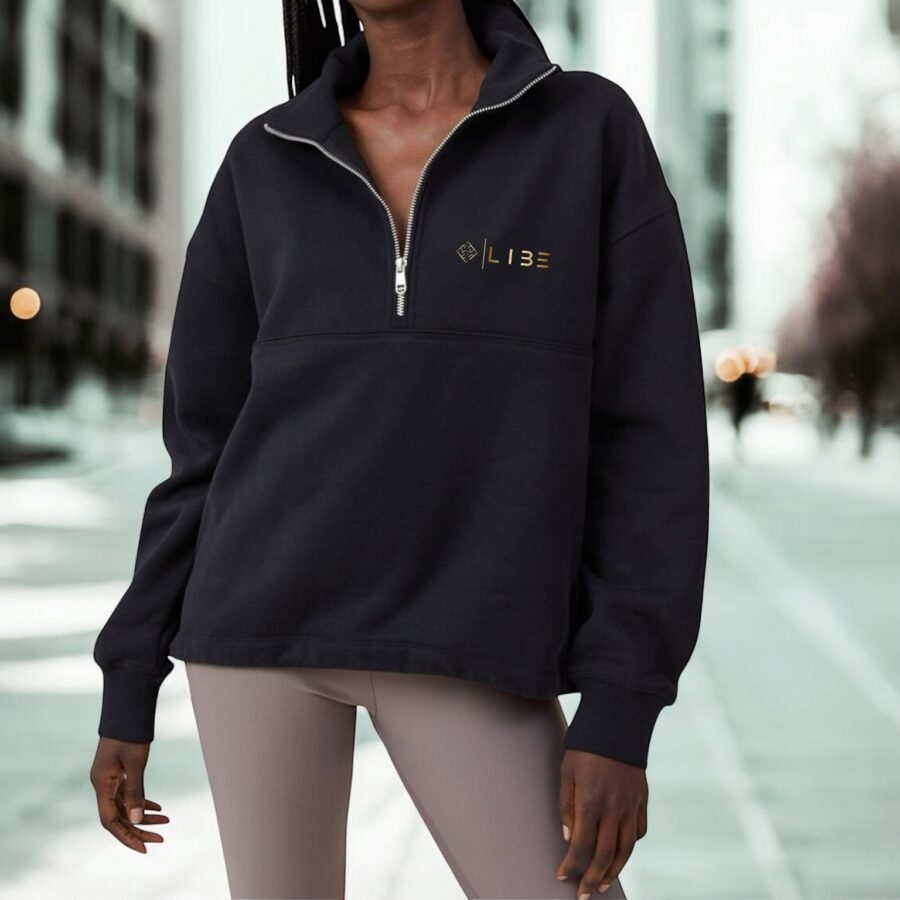 Black cotton winter hoodie,featuring a classic drawstring perfect for cold weather layering.